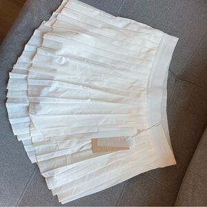 POPFLEX Ace Em Pleated Skirt